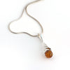 Baltic Amber Round Stone Silver Swirl Pendant available at The Amber Room