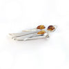 Baltic Amber Silver Angel Brooch available at The Amber Room